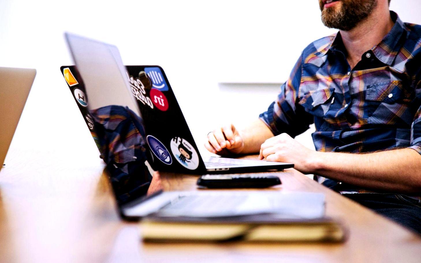 Budget planning workspace with financial documents and calculator