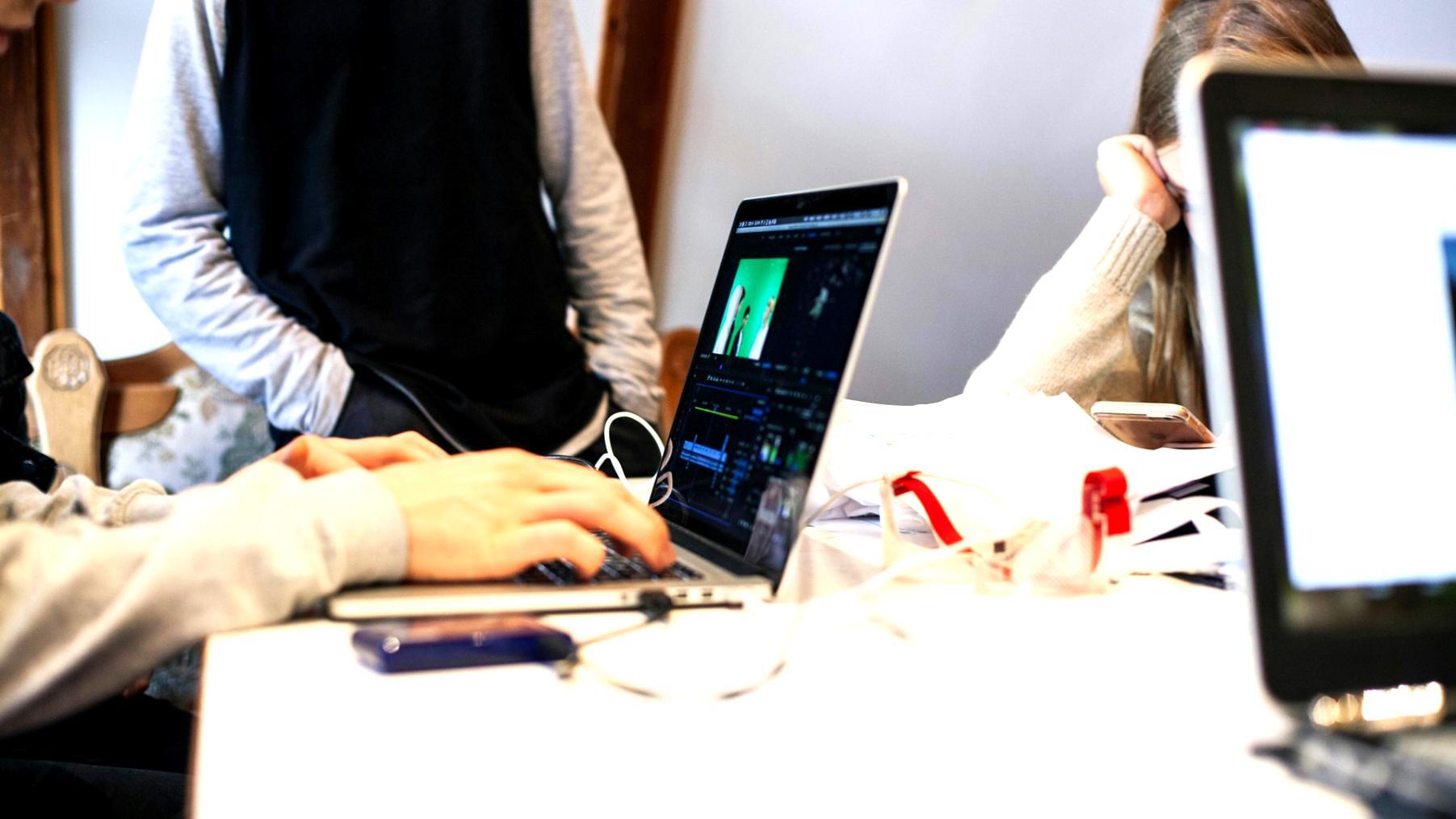 Financial planning workspace with budget documents and calculator