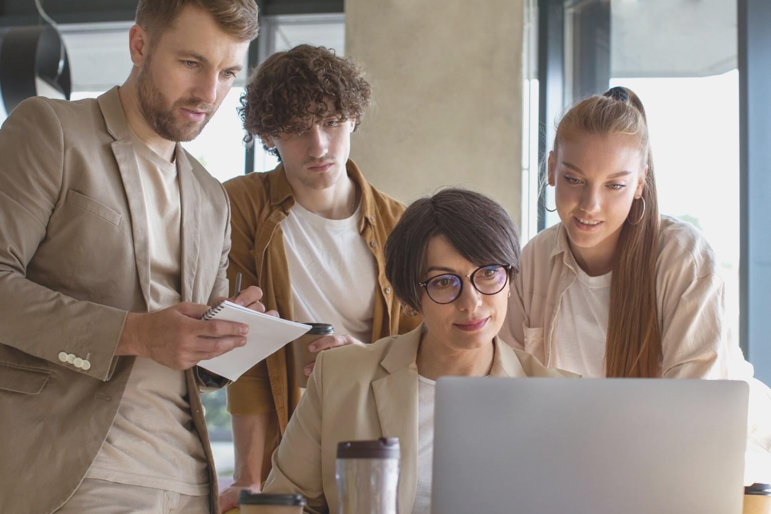Budget planning session with participants reviewing financial documents